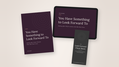 A digital mockup showing a dark purple booklet, a tablet, and a dark gray cheat sheet with motivational and self-help text on a light beige background.